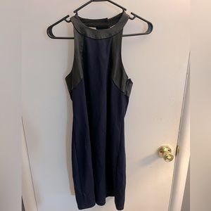 Navy blue cocktail dress with black pleather straps